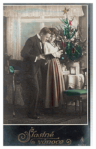 Šťastné vánoce - Dvojice s knihou (pohled)