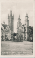 Klatovy - Nová radnice s Černou věží s Jesuitským kostelem (pohled)